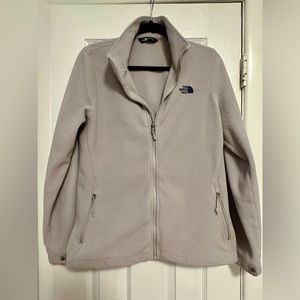 North Face fleece. Light grey with dark purple logo.